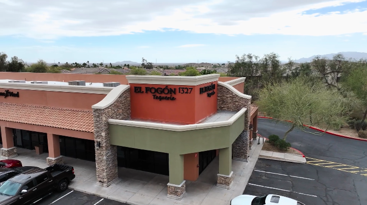 Refreshed restaurant exterior with new canopies and signage in Phoenix, AZ